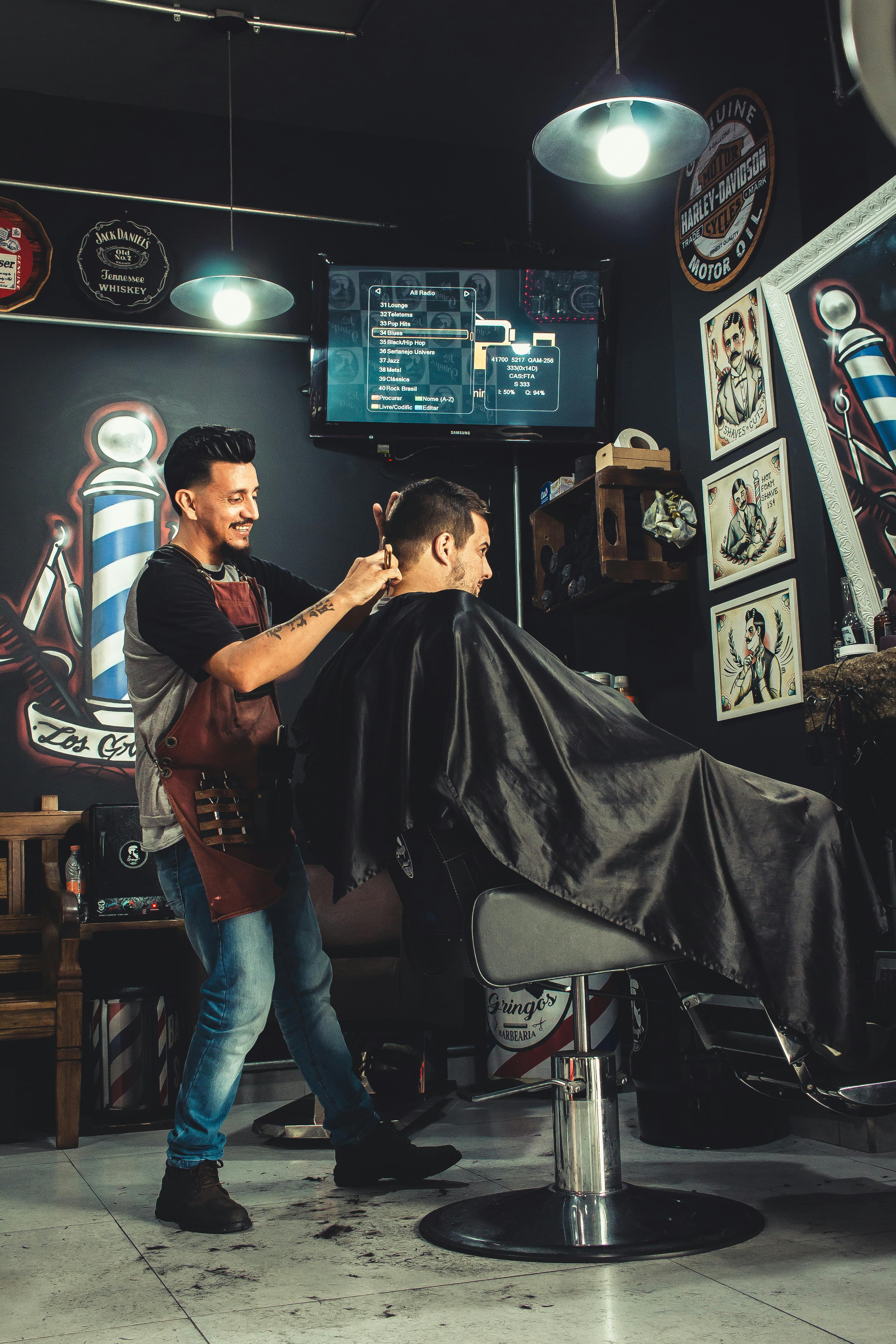 barbers cutting hair